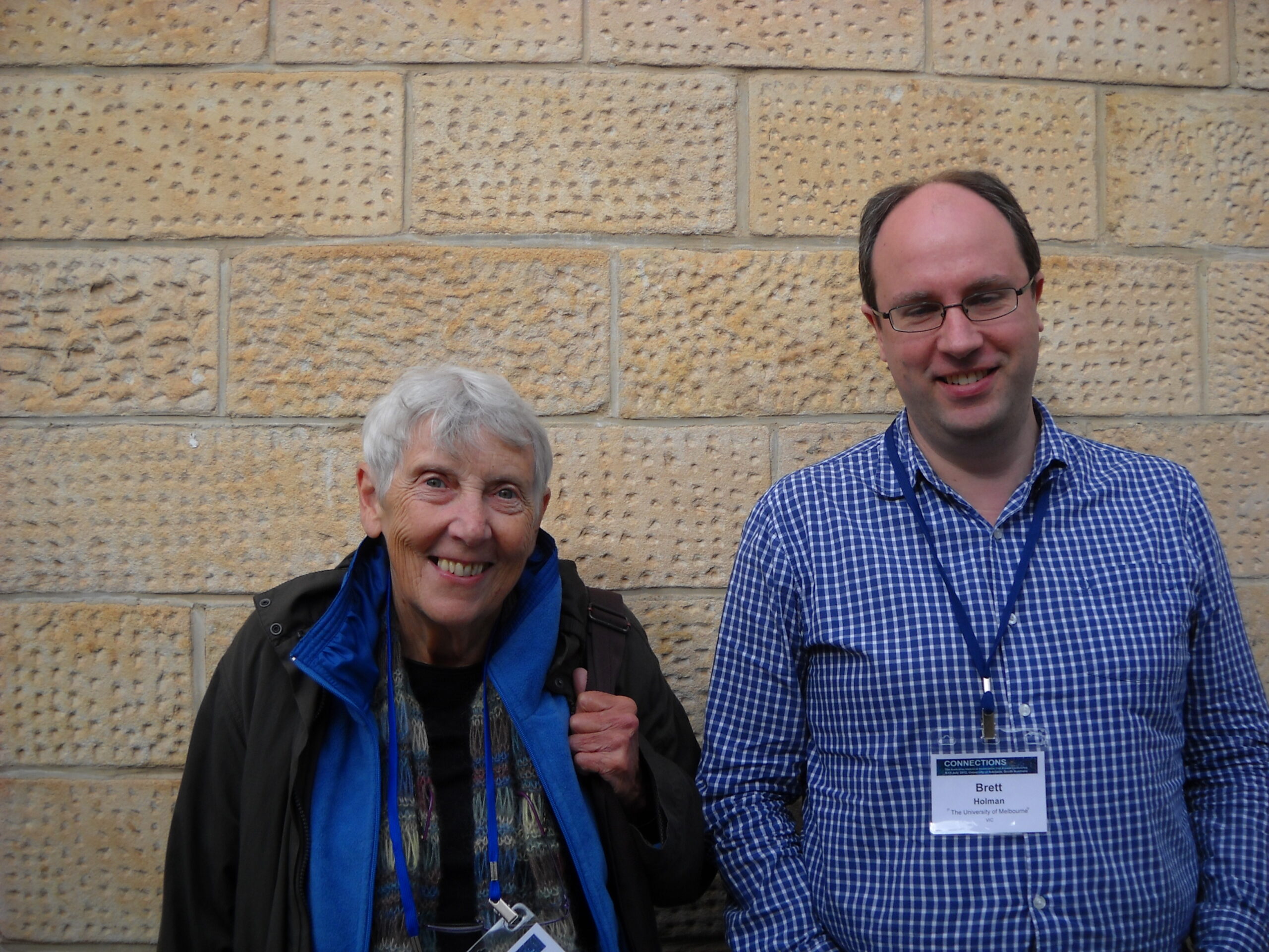 Jill Roe standing next to Brett Holman at the Australian Historical Association conference in Adelaide, 2012.
